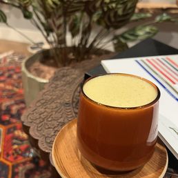 Delicious dairy free turmeric chai latte while I wait. Delicious dairy free turmeric chai latte while I wait.