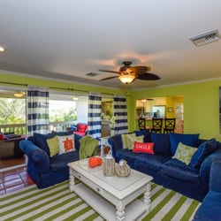 Anna Maria Island Home Rental - Sirenia Beach House Tropical Living Room