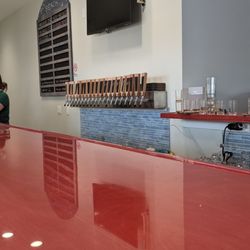 Bootlegger Beach Brewing - View of the taps, TV and the bar