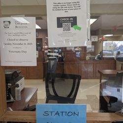 Bentonville Revenue Office - Close-up of QR code that you scan to get an online ticket to approach a counter window. You can sit anywhere.