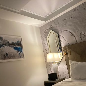 EXchange Hotel Vancouver - Art, mirror, lovely walls, and the best sight after travel- the bed - Hotels Near Me - Vancouver, British Columbia EXchange Hotel Vancouver - Art, mirror, lovely walls, and the best sight after travel- the bed - Hotels Near Me - Vancouver, British Columbia