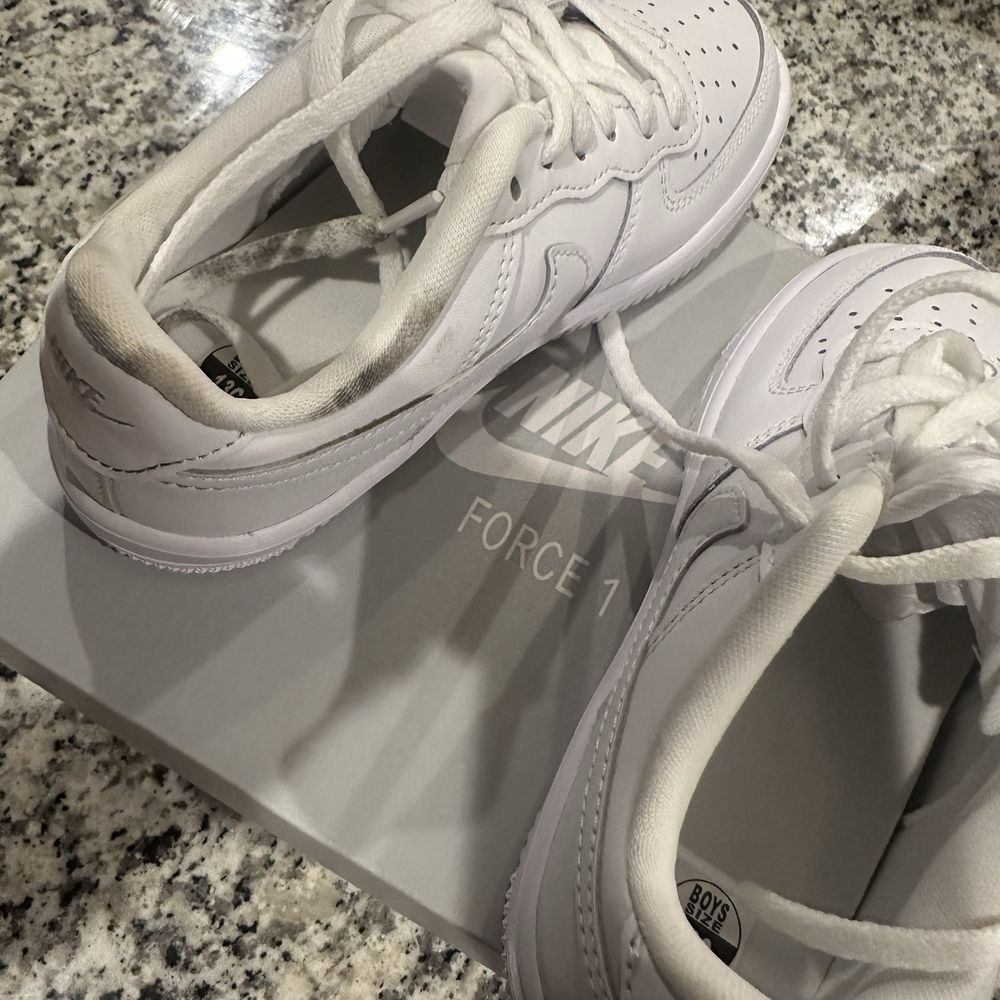 Finish Line - Left shoe, has all this black stuff. I always do videos when opening my shoes for this reason. - Outlet Stores Near Me - Cypress, Texas