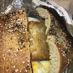 Bagels-4-u - 2 eggs with hash brown on an everything flagel.