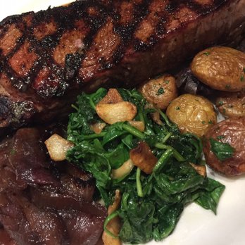 Bazille at Nordstrom - 10oz New York Strip Steak with grilled onion, spinach, and potato - New American Near Me - Boca Raton, Florida Bazille at Nordstrom - 10oz New York Strip Steak with grilled onion, spinach, and potato - New American Near Me - Boca Raton, Florida