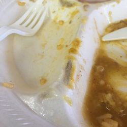 Sarah's Mexican Food - Microwaved plate. The styrofoam melted into my beans and rice.