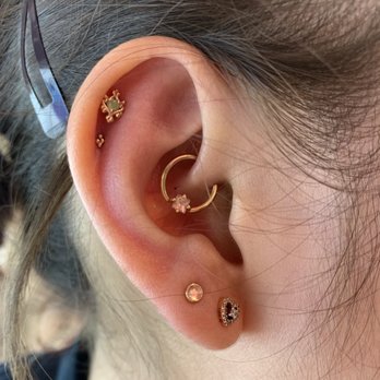 Laughing Buddha Seattle - Double helix, daith, and lobe piercing done on my right ear. I got another lobe piercing done on my left too. - Tattoo Near Me - Seattle, Washington Laughing Buddha Seattle - Double helix, daith, and lobe piercing done on my right ear. I got another lobe piercing done on my left too. - Tattoo Near Me - Seattle, Washington