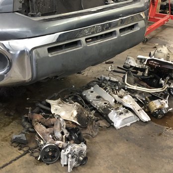 Exclusive Engine Rebuilding & Machine Shop - Engine piece is strewn about on the floor. - Auto Repair Near Me - Phoenix, Arizona Exclusive Engine Rebuilding & Machine Shop - Engine piece is strewn about on the floor. - Auto Repair Near Me - Phoenix, Arizona