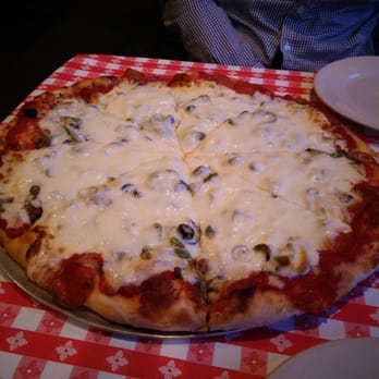 Filippi's Pizza Grotto Poway - Fit for a king (large) pizza - Italian Near Me - Poway, California Filippi's Pizza Grotto Poway - Fit for a king (large) pizza - Italian Near Me - Poway, California