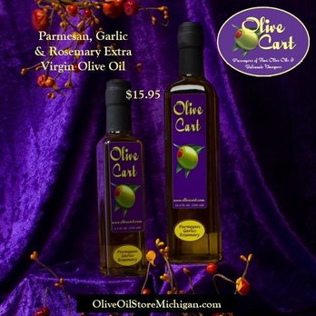 Olive Cart - two olive oil bottles on a purple background - Grocery Near Me - South Haven, Michigan Olive Cart - two olive oil bottles on a purple background - Grocery Near Me - South Haven, Michigan