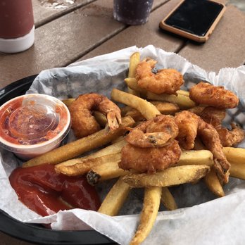 Finns Beachside Pub - Shrimp basket. - New American Near Me - Flagler Beach, Florida Finns Beachside Pub - Shrimp basket. - New American Near Me - Flagler Beach, Florida