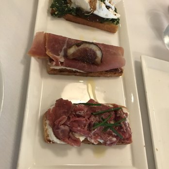 Fig & Olive - Crostini tasting - pesto and caprese, prosciutto and fig, tenderloin - French Near Me - Houston, Texas Fig & Olive - Crostini tasting - pesto and caprese, prosciutto and fig, tenderloin - French Near Me - Houston, Texas