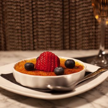 Mpire Club - Vanilla Creme Brulee garnished with fresh berries - Tapas/Small Plates Near Me - Washington, DC, District of Columbia Mpire Club - Vanilla Creme Brulee garnished with fresh berries - Tapas/Small Plates Near Me - Washington, DC, District of Columbia