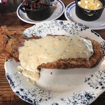 The Ranch - That's a pretty big chicken fry with jalapeño sausage gravy! - Steakhouses Near Me - Irving, Texas The Ranch - That's a pretty big chicken fry with jalapeño sausage gravy! - Steakhouses Near Me - Irving, Texas