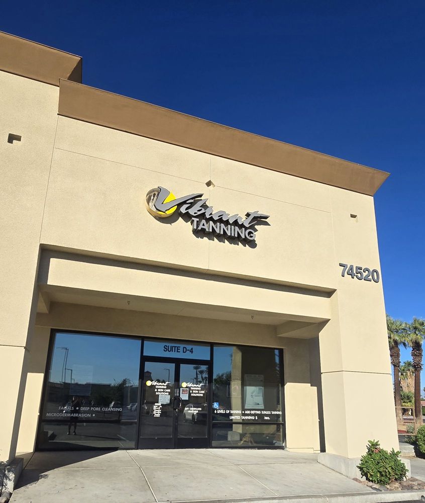 Vibrant Tanning Studios Logo