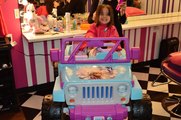 Fun, Stress-Free Haircuts - At Sharkey’s Cuts for Kids, we believe every haircut should be a fun and memorable adventure! Designed just for children ages 0-14, our salon transforms the typical haircut experience into something your family will look forward to. Kids can sit in one of our exciting vehicle chairs—like race cars, fire trucks, or police cruisers—while watching their favorite cartoons on individual TVs or playing Xbox and PS5 games. For older kids, our Tween Lounge offers a more grown-up salon experience in a safe, friendly setting. Book Now and call us today! Fun, Stress-Free Haircuts - At Sharkey’s Cuts for Kids, we believe every haircut should be a fun and memorable adventure! Designed just for children ages 0-14, our salon transforms the typical haircut experience into something your family will look forward to. Kids can sit in one of our exciting vehicle chairs—like race cars, fire trucks, or police cruisers—while watching their favorite cartoons on individual TVs or playing Xbox and PS5 games. For older kids, our Tween Lounge offers a more grown-up salon experience in a safe, friendly setting. Book Now and call us today!