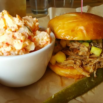 Revival Brews - Pulled pork sandwich with pineapple salsa and bell pepper potato salad. Yummy! - Pubs Near Me - Evergreen, Colorado Revival Brews - Pulled pork sandwich with pineapple salsa and bell pepper potato salad. Yummy! - Pubs Near Me - Evergreen, Colorado
