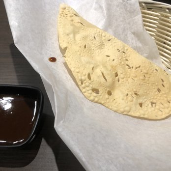 Monsoon Indian Restaurant - Complinentary papadam with sauce~ (half eaten) - Indian Near Me - Vancouver, British Columbia Monsoon Indian Restaurant - Complinentary papadam with sauce~ (half eaten) - Indian Near Me - Vancouver, British Columbia