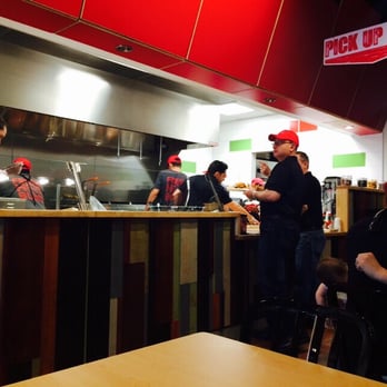 MOOYAH Burgers, Fries & Shakes - Assembly line of workers that put your food together... - Burgers Near Me - Irvine, California