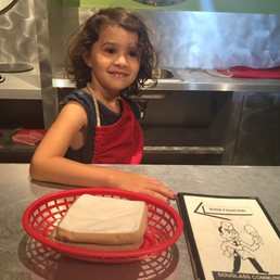 My niece, working the counter.