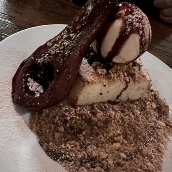 Il Nido - Angel food cake with poached pear - Italian Near Me - Seattle, Washington Il Nido - Angel food cake with poached pear - Italian Near Me - Seattle, Washington