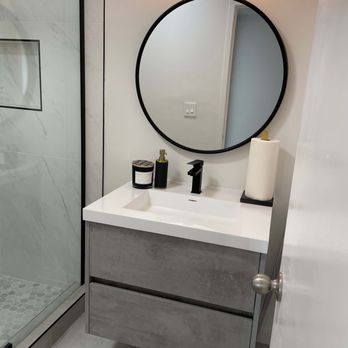 Eram Builder - a before and after picture of a bathroom - Flooring Near Me