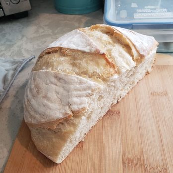 Delaware Street Bakery - a loaf of bread on a cutting board - Bakeries Near Me - Huntington Beach, California Delaware Street Bakery - a loaf of bread on a cutting board - Bakeries Near Me - Huntington Beach, California