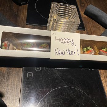 The Melting Pot - Added special touch of dipped strawberries awaiting us when we arrived. - Fondue Near Me - Colorado Springs, Colorado