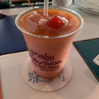 Crabby's Beachside Pavilion - Frozen rum dinner: tastes like a strawberry banana smoothie! - Seafood Near Me - Clearwater Beach, Florida