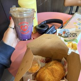 Ube latte with the breakfast sandwich. Ube latte with the breakfast sandwich.