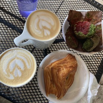 The Avondale Coffee Club - Lavender and rosemary latte, vegan matcha muffin with a raspberry center, and a feta and spinach croissant. - Coffee & Tea Near Me - Chicago, Illinois The Avondale Coffee Club - Lavender and rosemary latte, vegan matcha muffin with a raspberry center, and a feta and spinach croissant. - Coffee & Tea Near Me - Chicago, Illinois