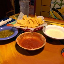 El Parian - (L to R) Hot salsa, medium salsa (comes w/ chips), and cheese dip