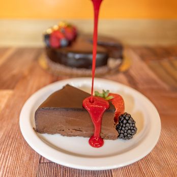 Windy Ridge Bakery - Chocolate decadence cake - flourless dark chocolate cake, chocolate ganache, fresh berries - Bakeries Near Me - Park City, Utah Windy Ridge Bakery - Chocolate decadence cake - flourless dark chocolate cake, chocolate ganache, fresh berries - Bakeries Near Me - Park City, Utah