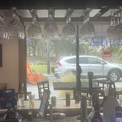 The Links of Sandpiper - This is the orange tractor, that the owner said belongs to him, that is attempting to illegally tow the vehicle that is temporarily parked..