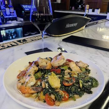 Station 45 American Chophouse - a plate of shrimp and vegetables - American Near Me - Binghamton, New York Station 45 American Chophouse - a plate of shrimp and vegetables - American Near Me - Binghamton, New York
