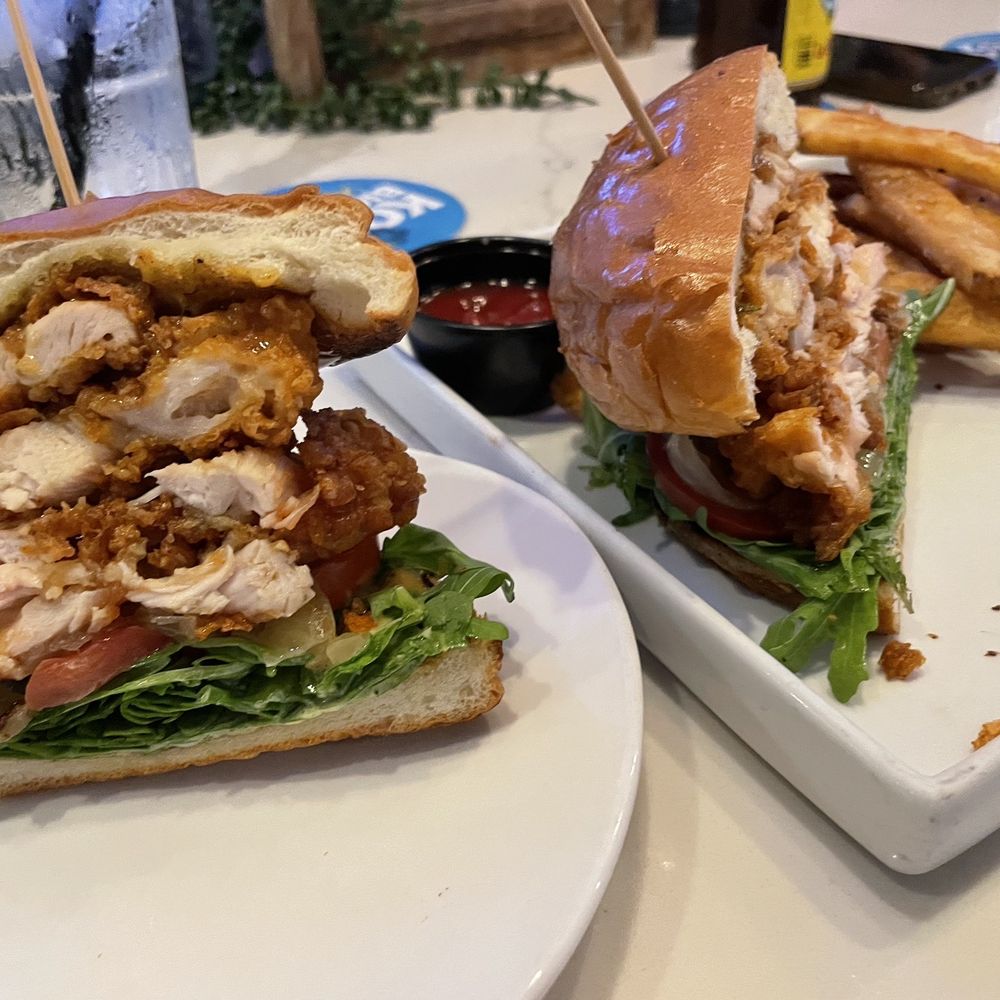 Chicken sandwich stacked with chicken Chicken sandwich stacked with chicken