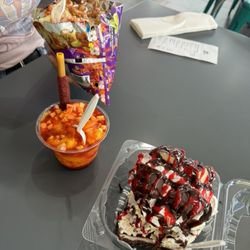 La Michoacana Costa - From top to bottom: Tostitos with cueritos, mangonada, and a gansito split.