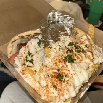 Stop N Go Gyros - Traditional Gyro Combo with Greek Fries. Extra Tzatziki Sauce on the Gyro Sandwich and extra Garlic Sauce on the Greek Fries. - Mediterranean Near Me - Richardson, Texas