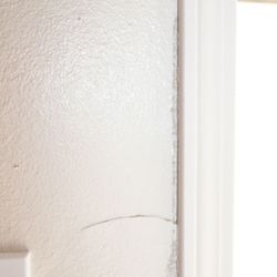 Discount Door and Window - Inside the garage, the drywwall was torn.