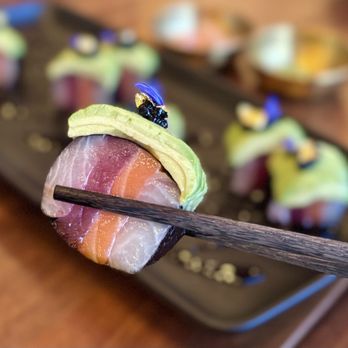 Ember Steak - Mosaic Roll w/ ahi, hamachi, ocean trout, avocado, wasabi rice blossom, sweet kecap manis ($28) - Steakhouses Near Me - Napa, California Ember Steak - Mosaic Roll w/ ahi, hamachi, ocean trout, avocado, wasabi rice blossom, sweet kecap manis ($28) - Steakhouses Near Me - Napa, California