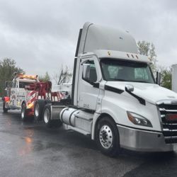 The Auto Barn - We Tow Tractors and Trailers!