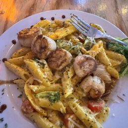 Scallops with white wine reduction. Scallops with white wine reduction.