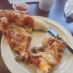 Downtown Pizza - Pepperoni and everything Pizza.