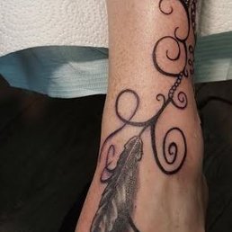 Ankle tattoo roles over to top of foot. 1of2 This is foot side. Ankle tattoo roles over to top of foot. 1of2 This is foot side.