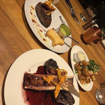 The Bancroft - 12oz filet. Polenta fries. Steak au pouvre with bone marrow - New American Near Me - Burlington, Massachusetts The Bancroft - 12oz filet. Polenta fries. Steak au pouvre with bone marrow - New American Near Me - Burlington, Massachusetts