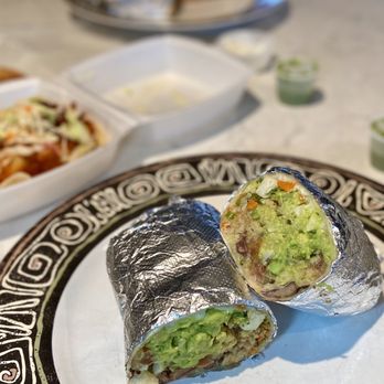CocoRay's - Veggie burrito (rice, beans, guac, cilantro, salsa, sautéed carrots, broccoli and onion) - Puerto Rican Near Me - Lawrence, Massachusetts