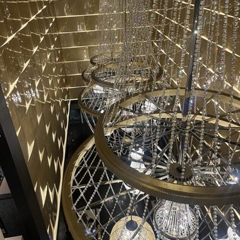 Dolby Live - Glamorous chandelier inside staircase lobby - Performing Arts Near Me - Las Vegas, Nevada