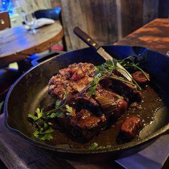 The Old Mill - a skillet with meat and vegetables - New American Near Me - Roxbury, New York
