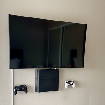 Shatun Brothers - TV + PS4 + controllers mounted (Bedroom) - TV Mounting Near Me Shatun Brothers - TV + PS4 + controllers mounted (Bedroom) - TV Mounting Near Me