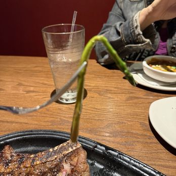 Outback Steakhouse - This shows the wilted, soggy asparagus, and the small amount of steak remaining after only some of the fat was cut away - Steakhouses Near Me - Kendall, Florida Outback Steakhouse - This shows the wilted, soggy asparagus, and the small amount of steak remaining after only some of the fat was cut away - Steakhouses Near Me - Kendall, Florida