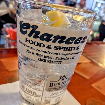 Chances - a glass of water with ice and lemon - American Near Me - Rochester, Wisconsin